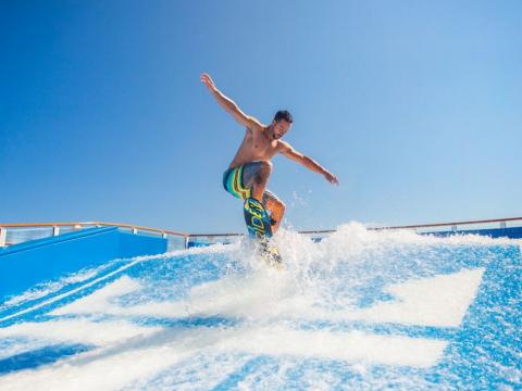 flowrider-surf-simulator-instructor-man-day-activity.jpg